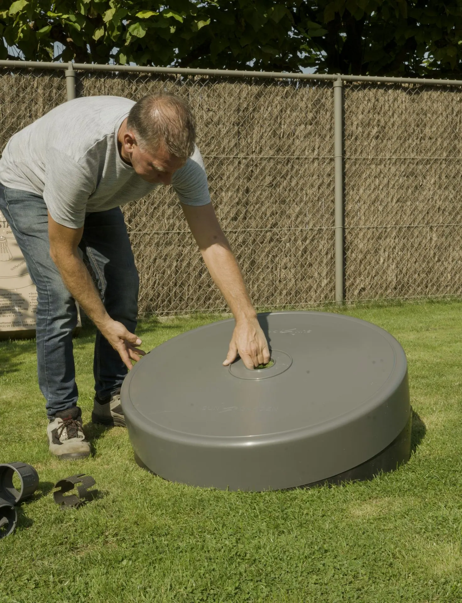 Place top of parasol base on filled bottom